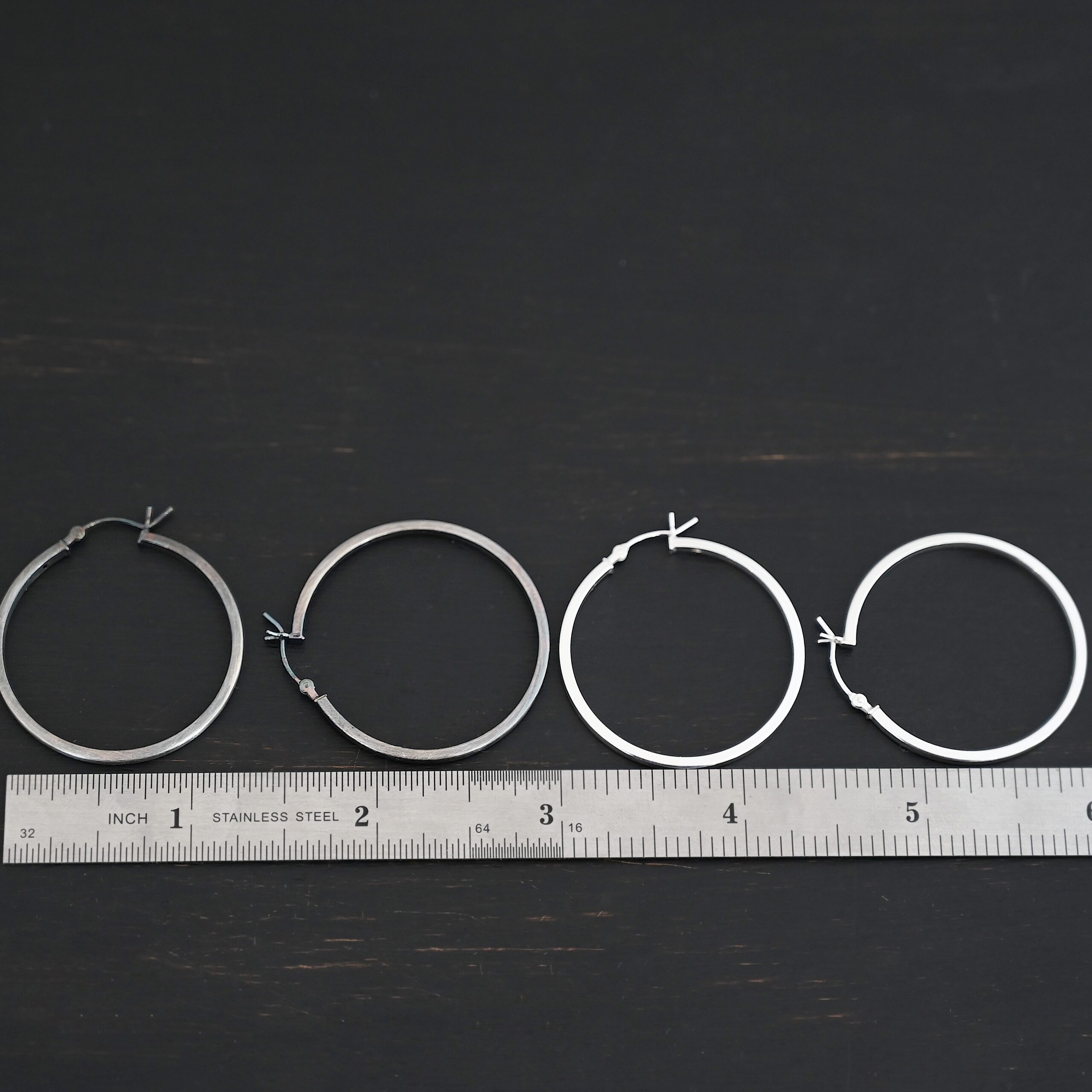Sterling Silver Frankie Square Hoop Earrings 35mm shiny and oxidized shown by ruler