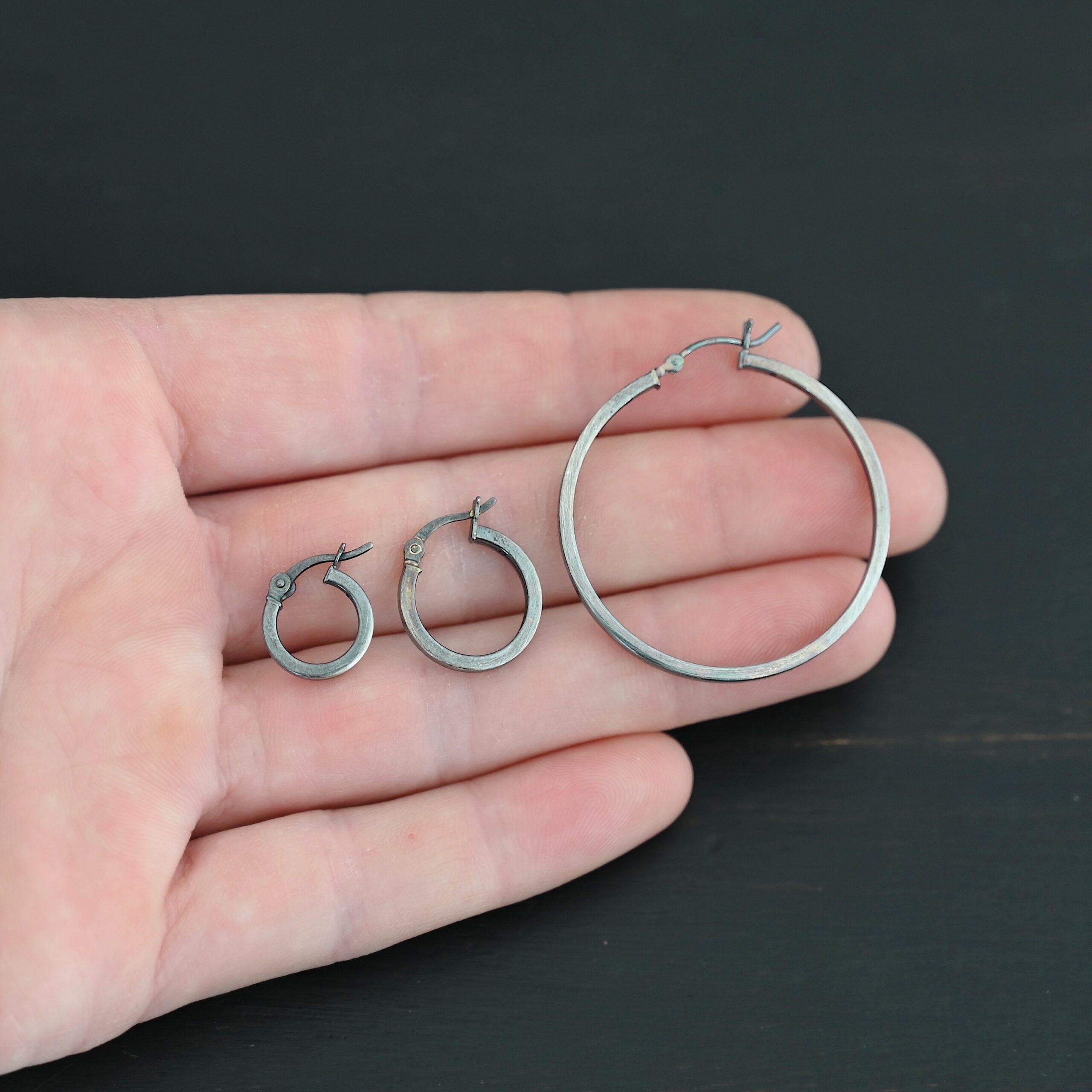 Sterling Silver Frankie Square Hoop Earrings all sizes oxidized shown in hand