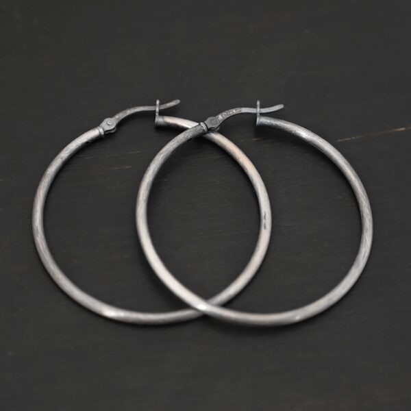 Sterling Silver Francesca Hoops 40mm oxidized shown on dark background