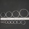 Sterling Silver Francesca Hoops all sizes oxidized shown by ruler