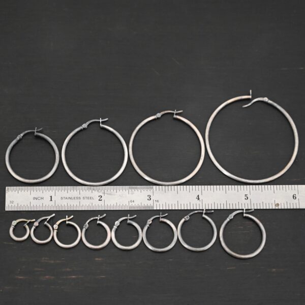 Sterling Silver Francesca Hoops all sizes oxidized shown by ruler