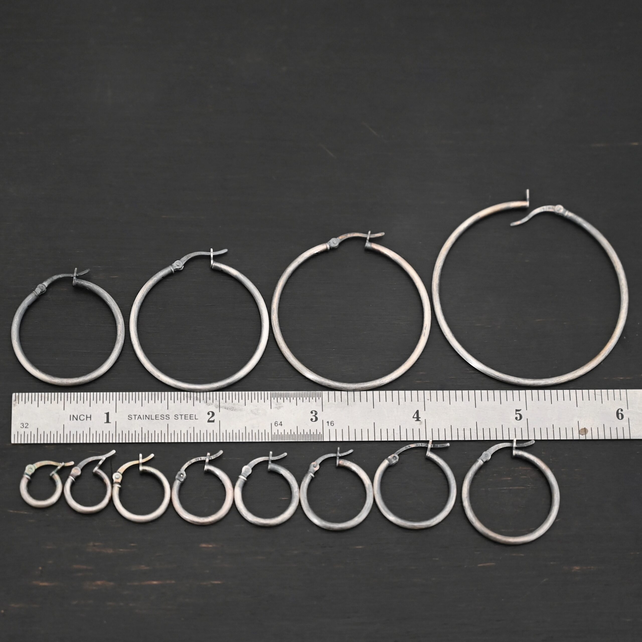Francesca Hoops oxidized Sterling Silver Francesca Hoops all sizes oxidized shown by ruler
