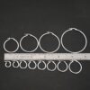 Sterling Silver Francesca Hoops all sizes shiny shown by ruler