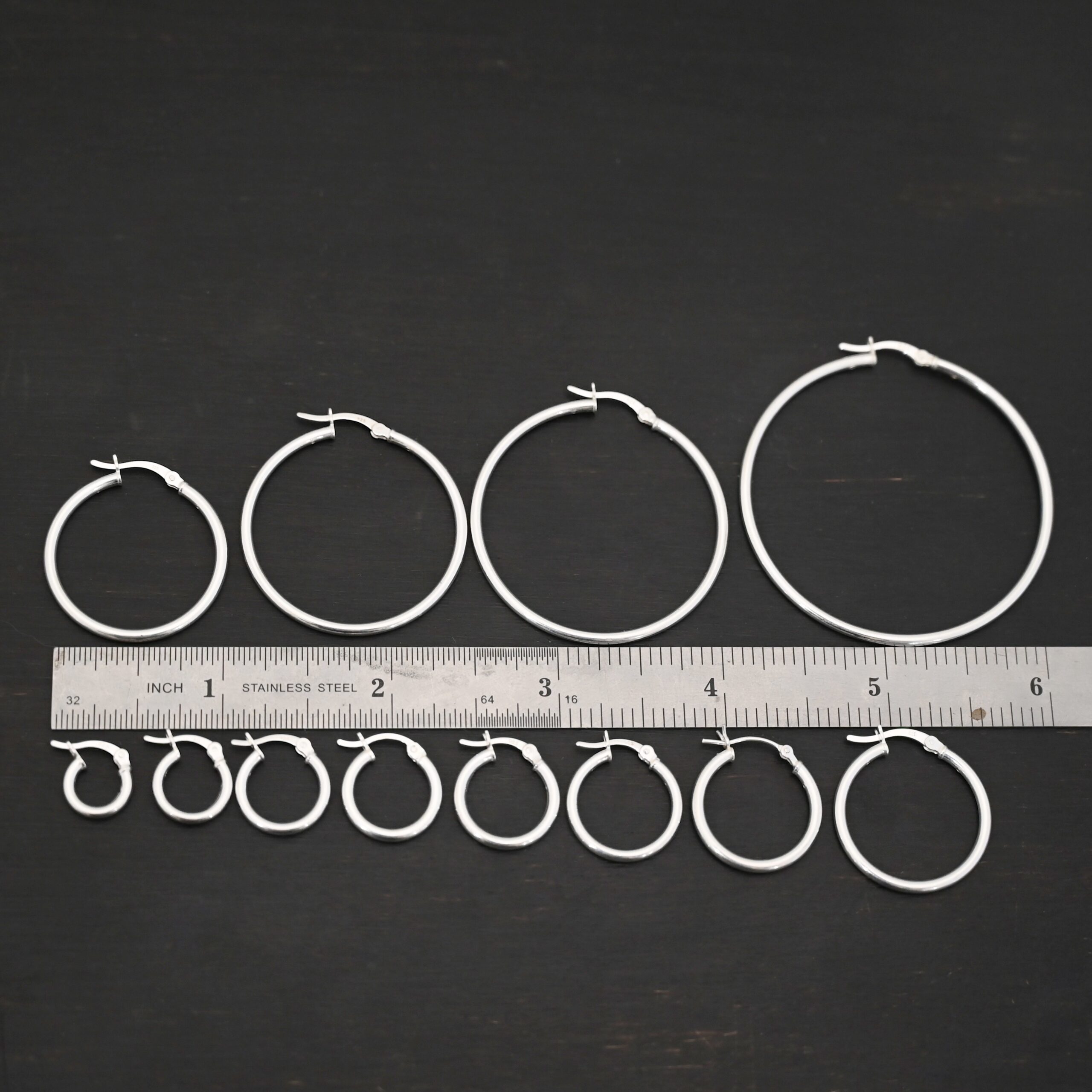 Francesca Hoops shiny Sterling Silver Francesca Hoops all sizes shiny shown by ruler
