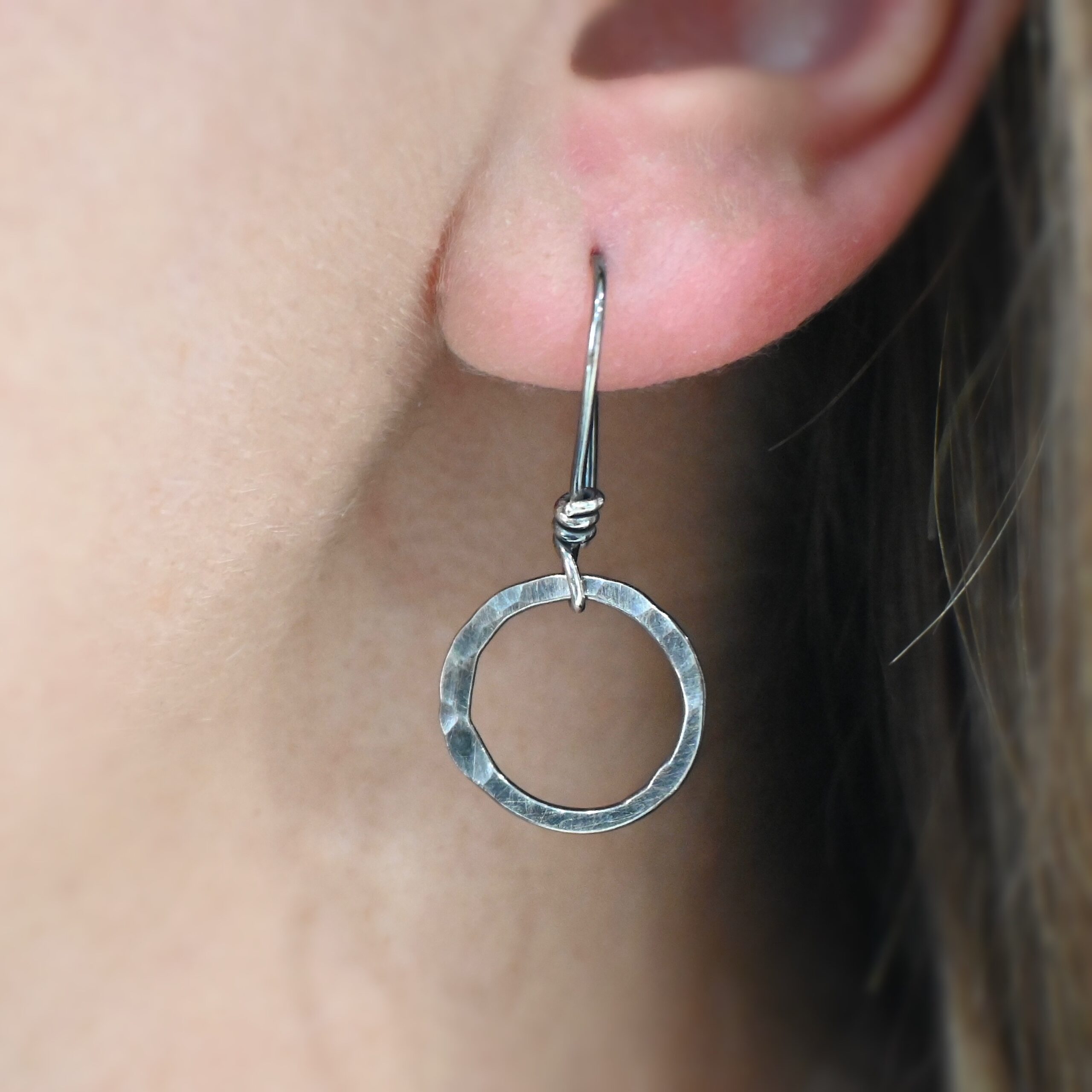 Sterling Silver Flora Hammered Circle Earrings oxidized shown on model
