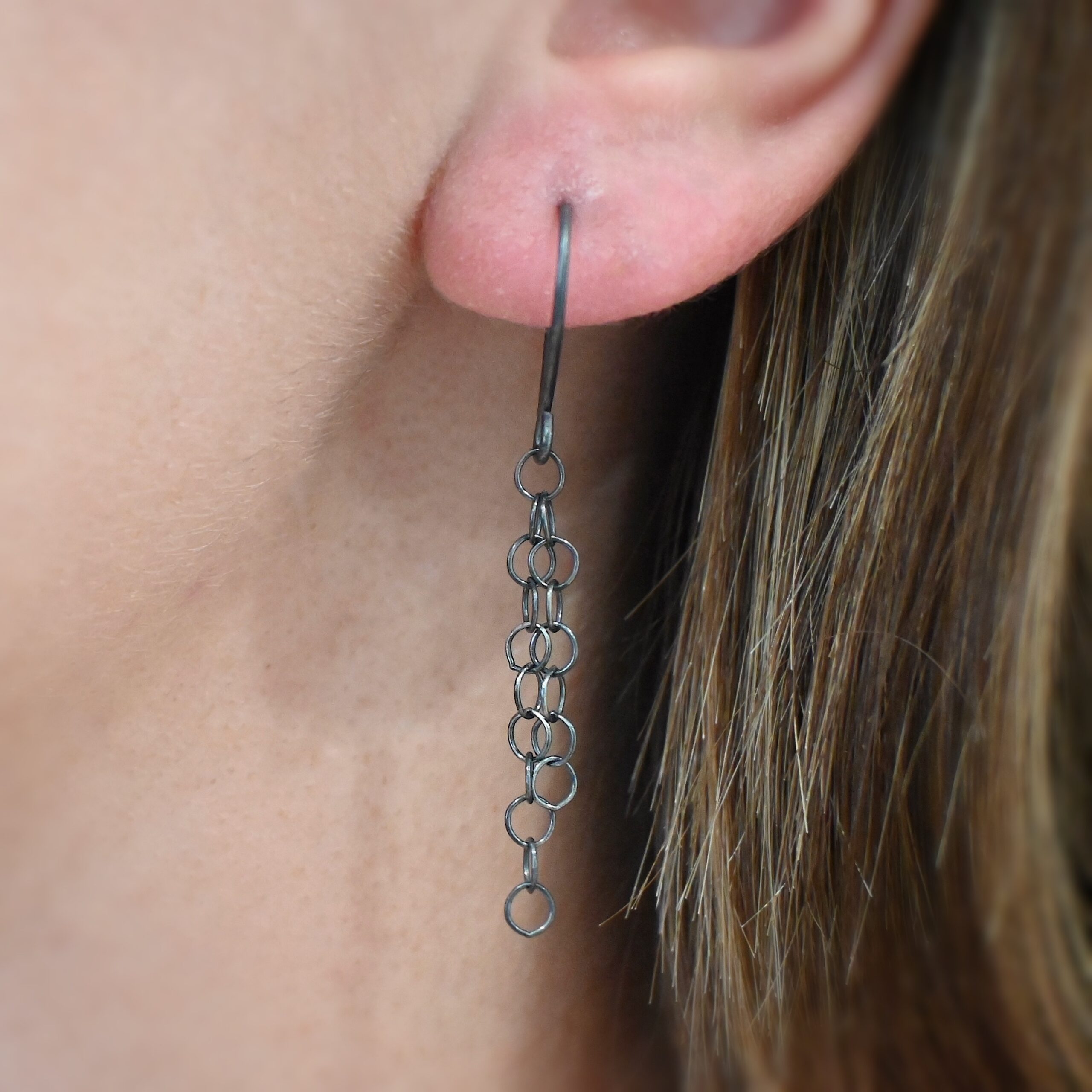 Sterling Silver Florella Hammered Circle Earrings oxidized shown on model