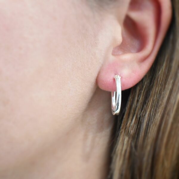 Sterling Silver Frances Oval Hoop Earring 22mm shown on model