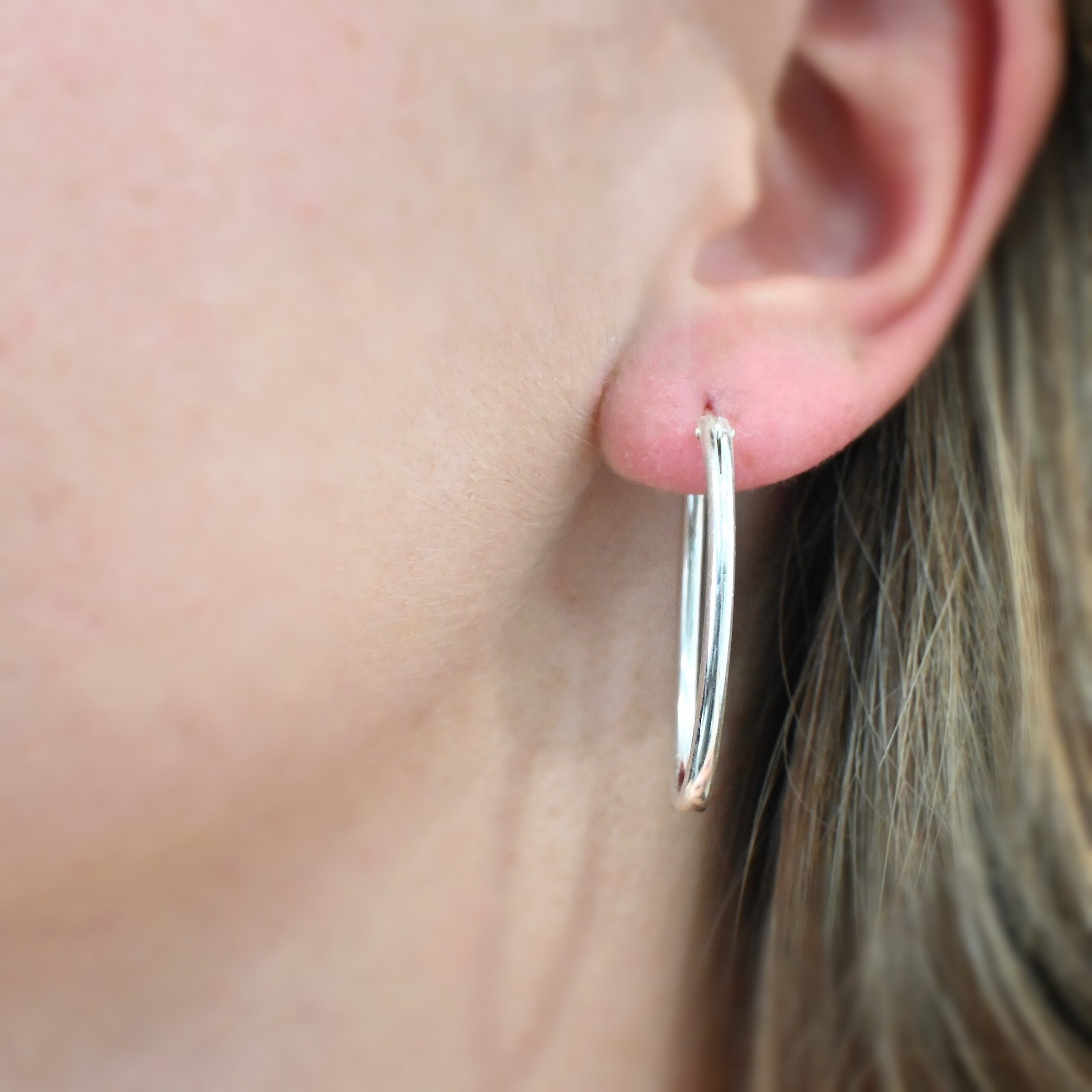 Sterling Silver Frances Oval Hoop Earring 34mm shown on model