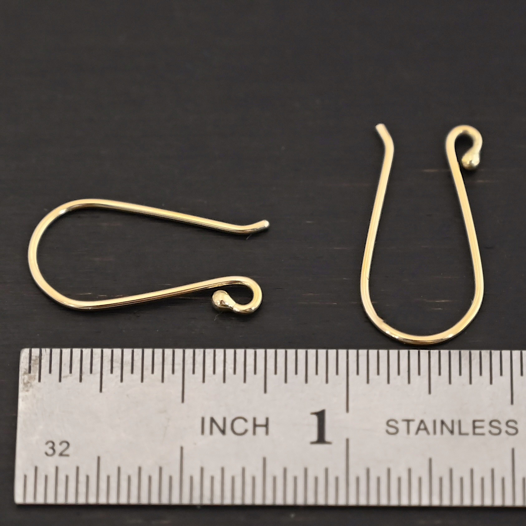 18k gold Whitney Ear Wire shown by ruler
