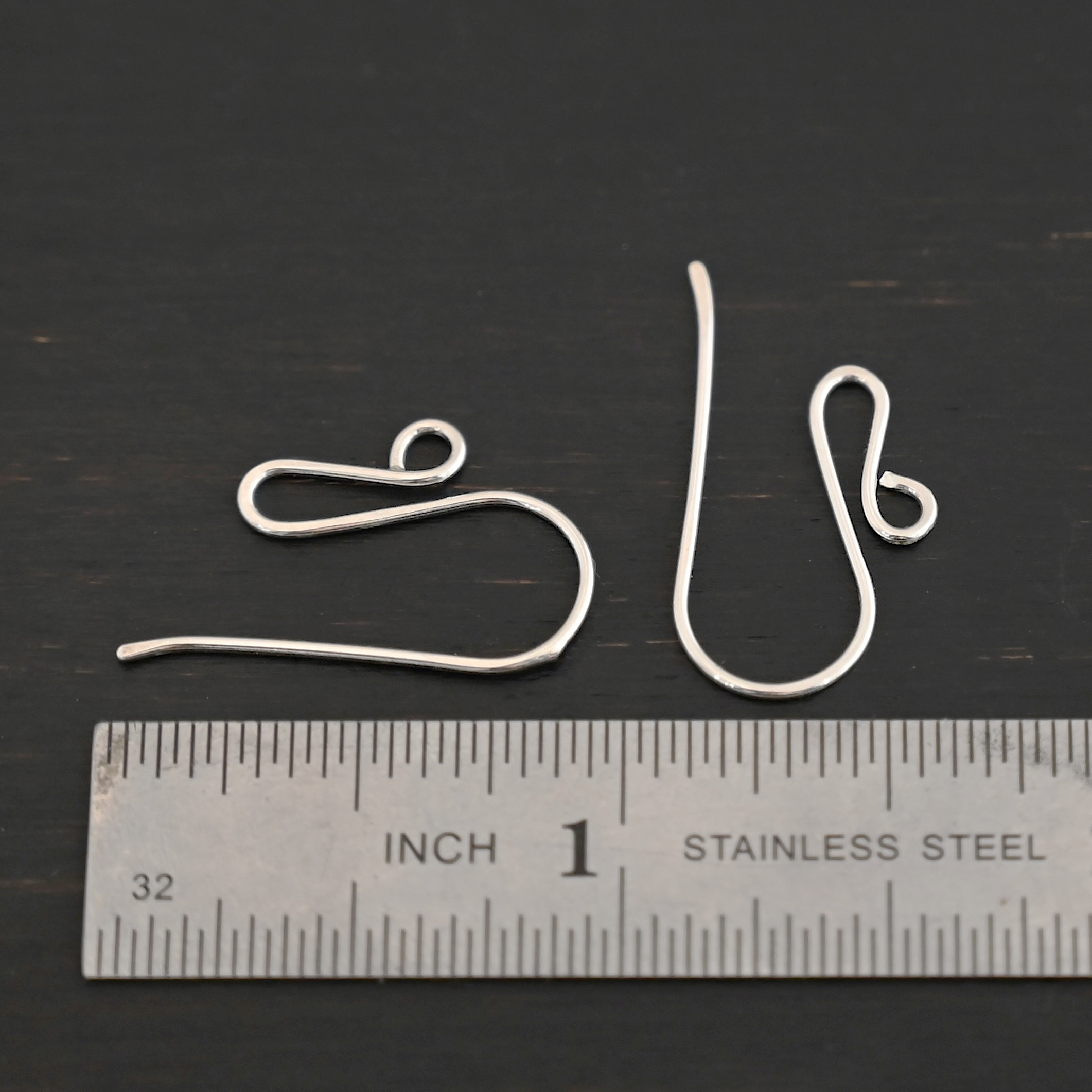 sterling silver Woodlyn Ear Wire - shiny shown by ruler