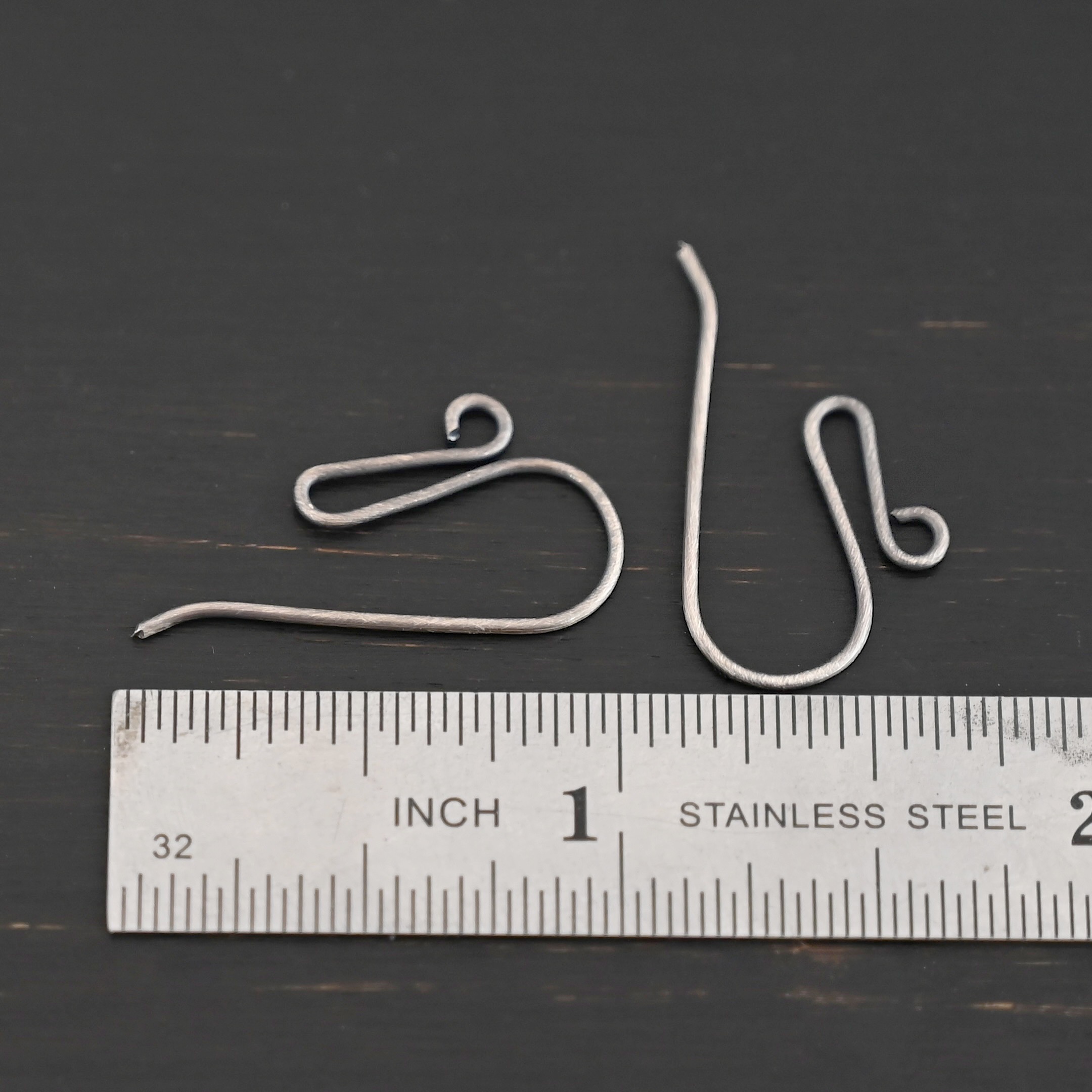 sterling silver Woodlyn Ear Wire - oxidized shown by ruler