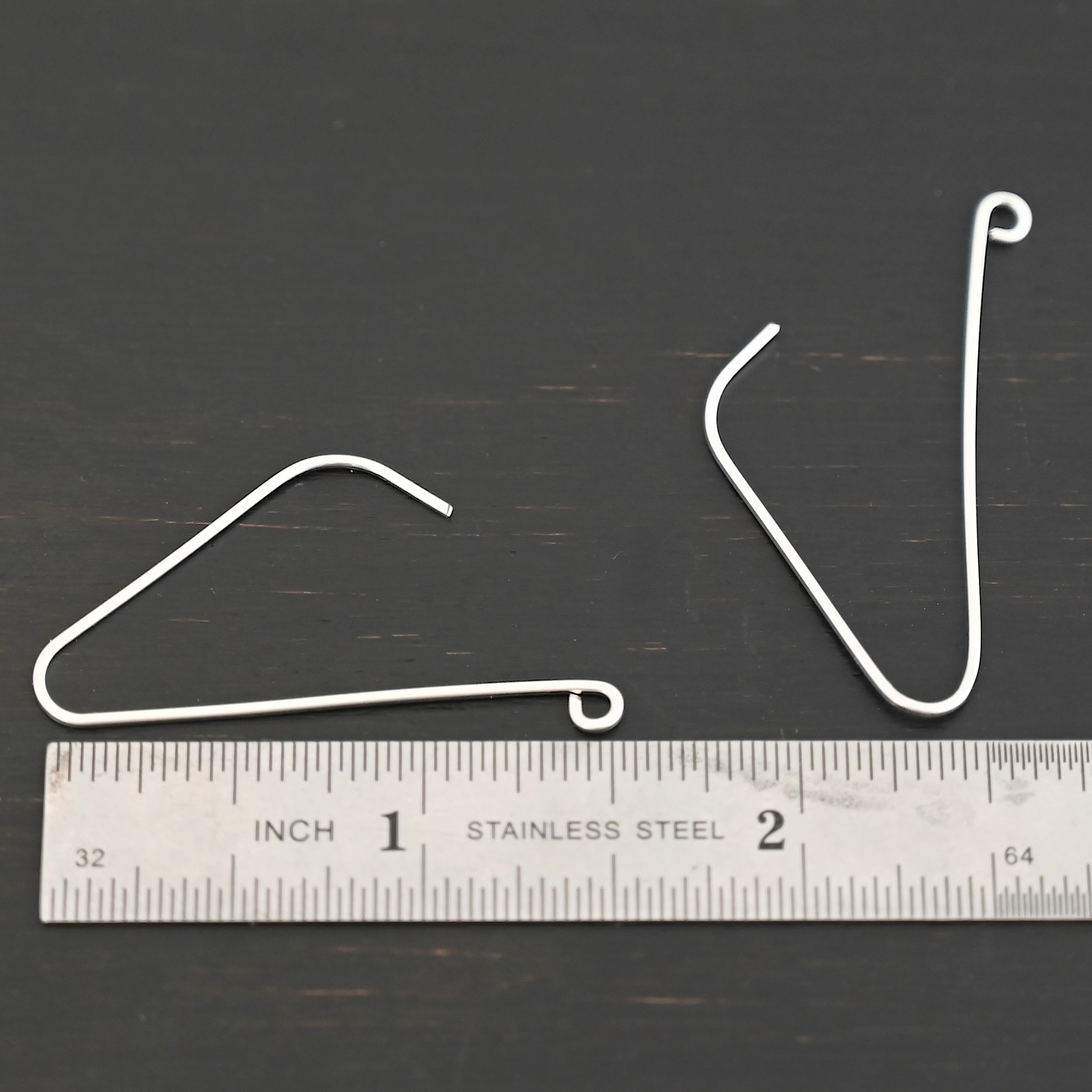 sterling silver Whimsical Ear Wire - shiny 1.5" shown by ruler