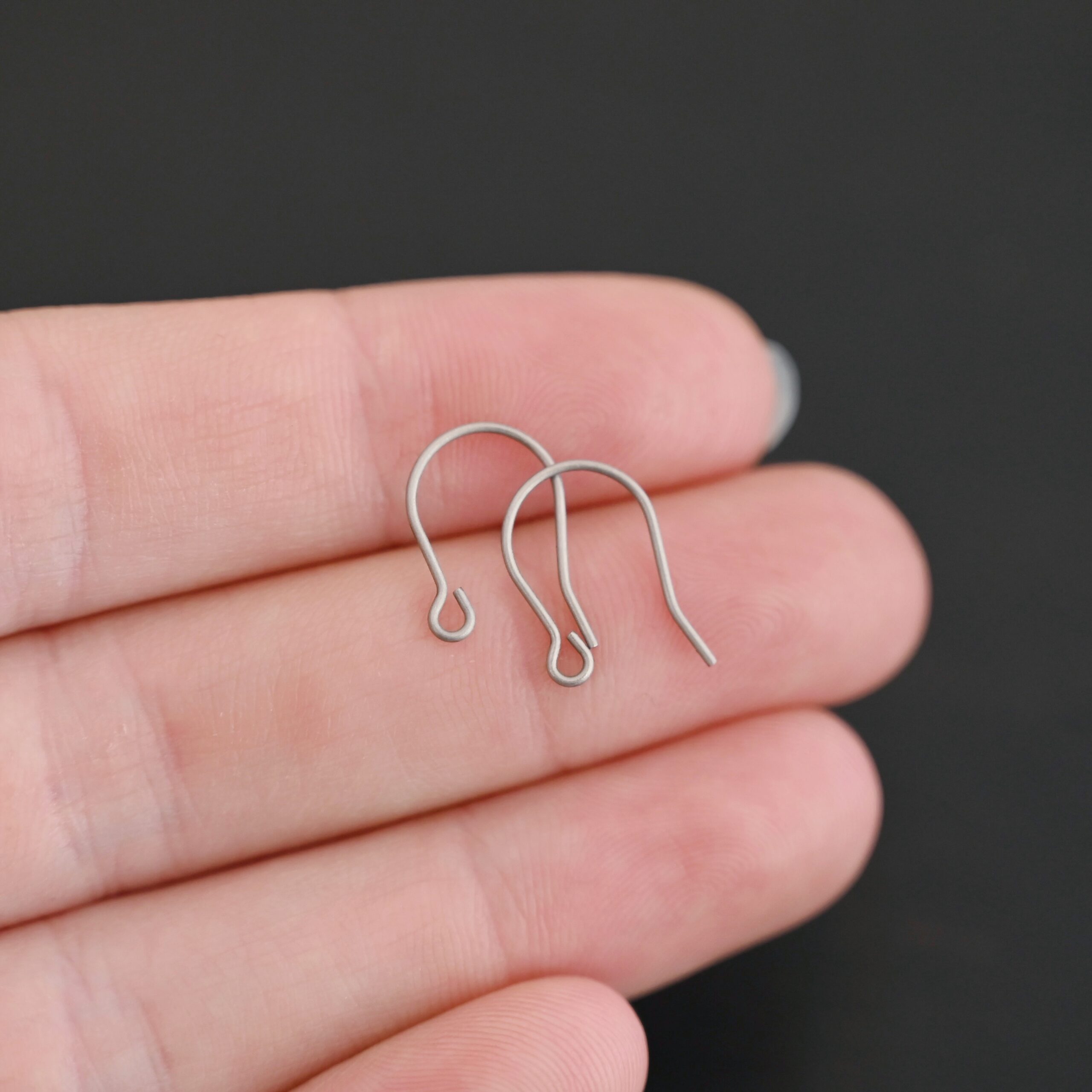 Wednesday Titanium Ear Wire - 16mm Wednesday Titanium Ear Wire - 16mm shown in hand