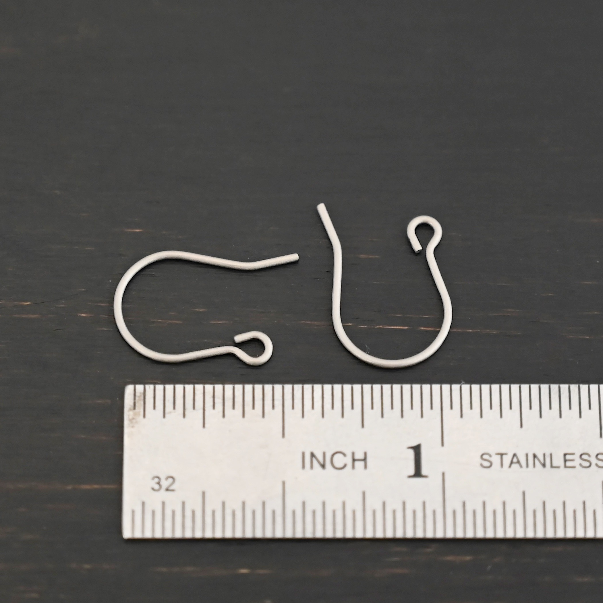 Wednesday Titanium Ear Wire - 16mm Wednesday Titanium Ear Wire - 16mm shown by ruler