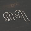 Wednesday Titanium Ear Wire - 23mm & 16mm shown on dark background