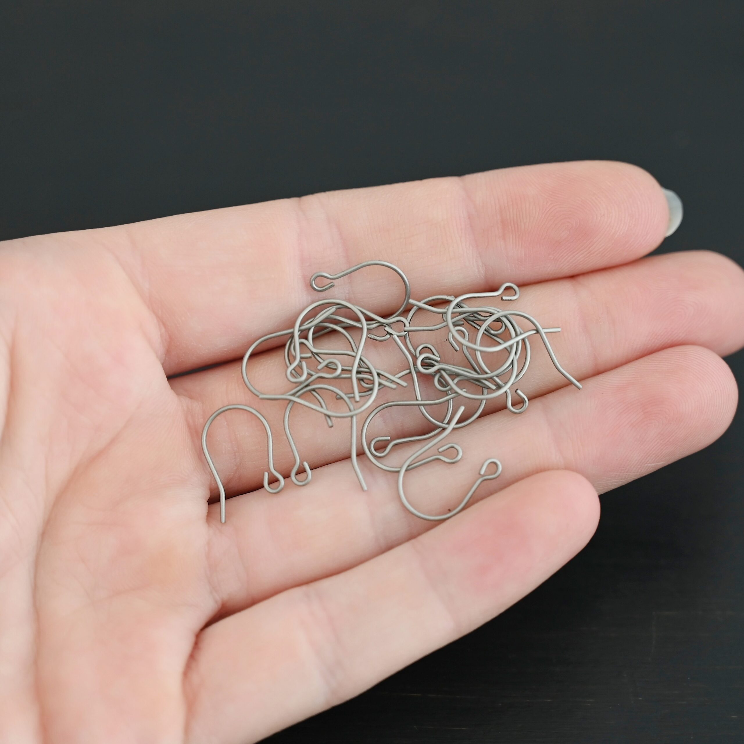 Wednesday Titanium Ear Wire - 16mm Wednesday Titanium Ear Wire - 16mm shown in hand