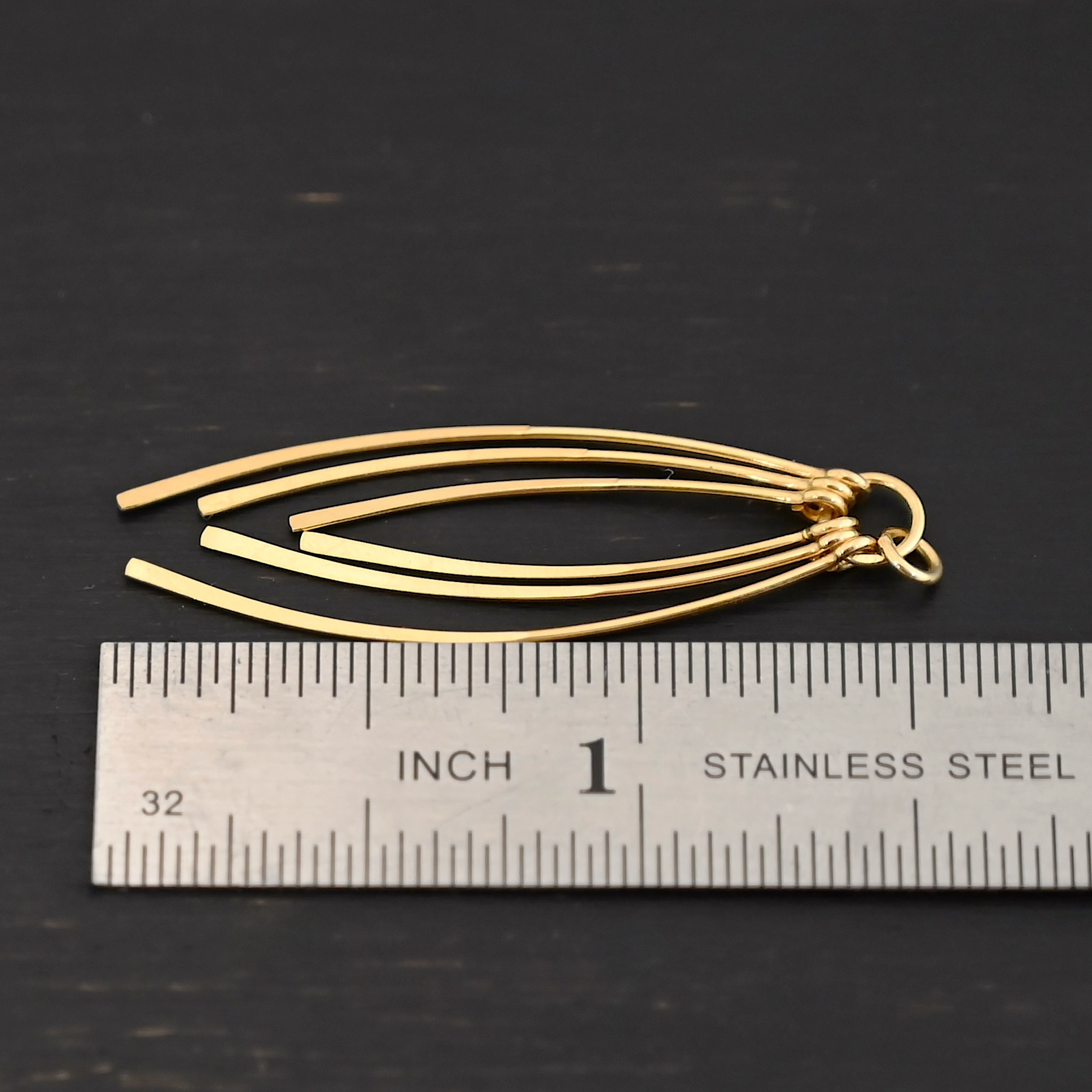 Topanga - Gold Plated Tassle shown by ruler