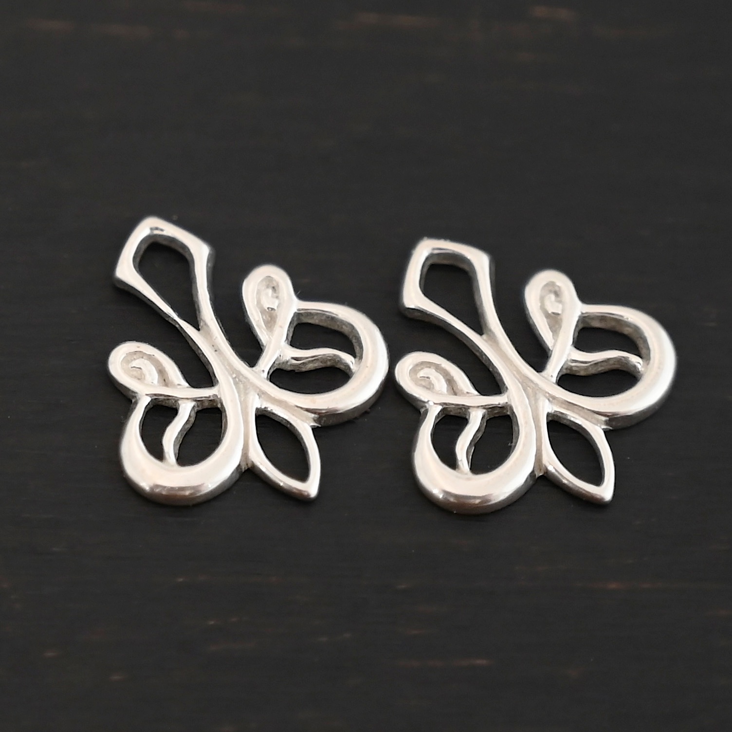 Sterling Silver Tillie Filigree Chandelier shiny shown on dark background