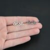 Sterling Silver Tillie Filigree Chandelier oxidized & shiny shown in hand