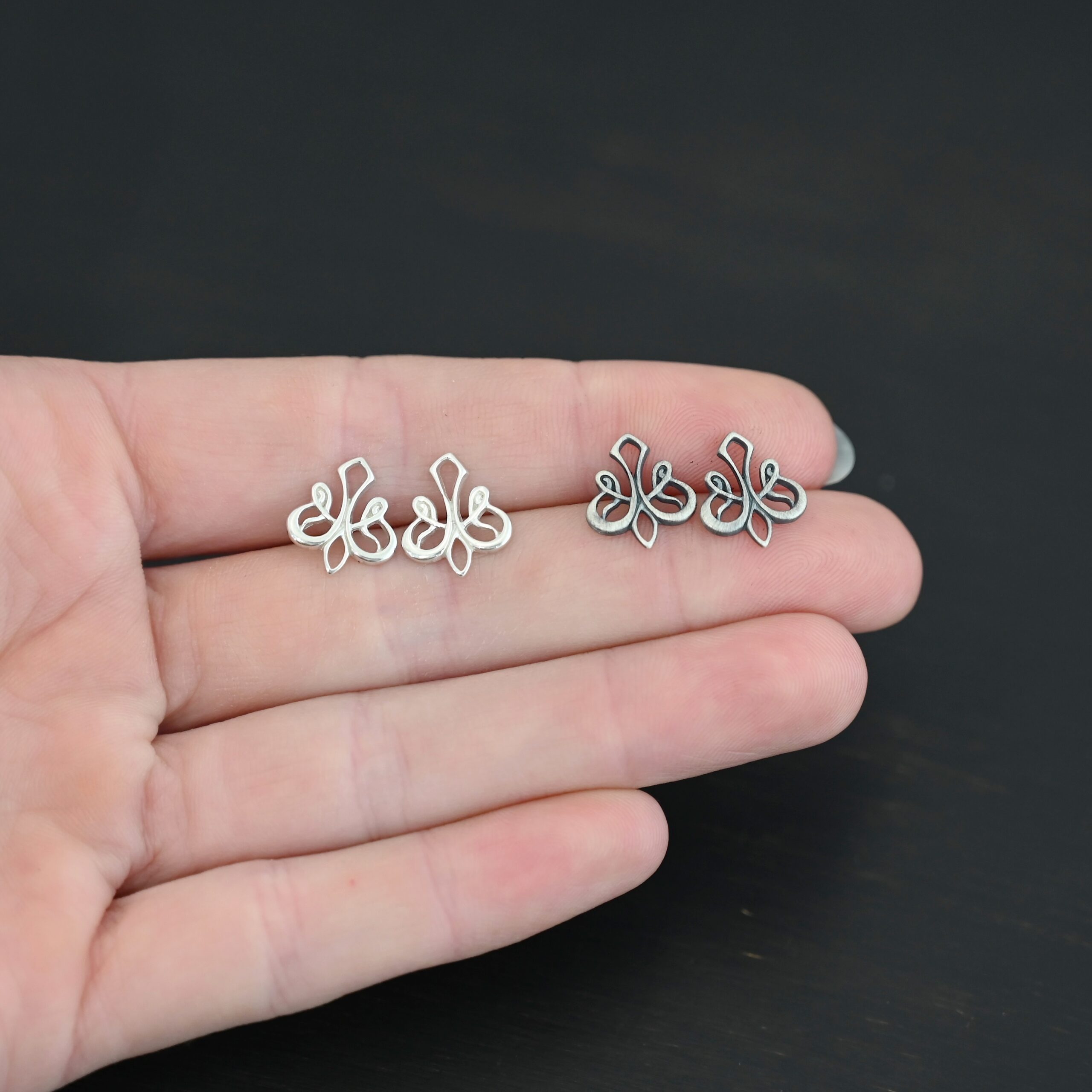 Sterling Silver Tillie Filigree Chandelier oxidized & shiny shown in hand