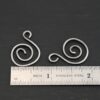 Sterling Silver Teagan S Shaped Pair - oxidized smooth shown by ruler