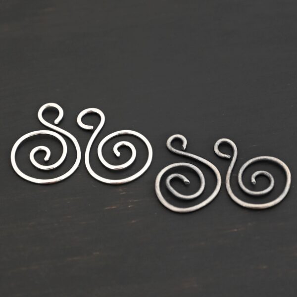Sterling Silver Teagan S Shaped Pair - oxidized & shiny smooth shown on dark background