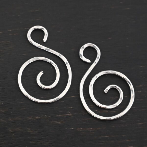 Sterling Silver Teagan S Shaped Pair - shiny hammered shown on dark background