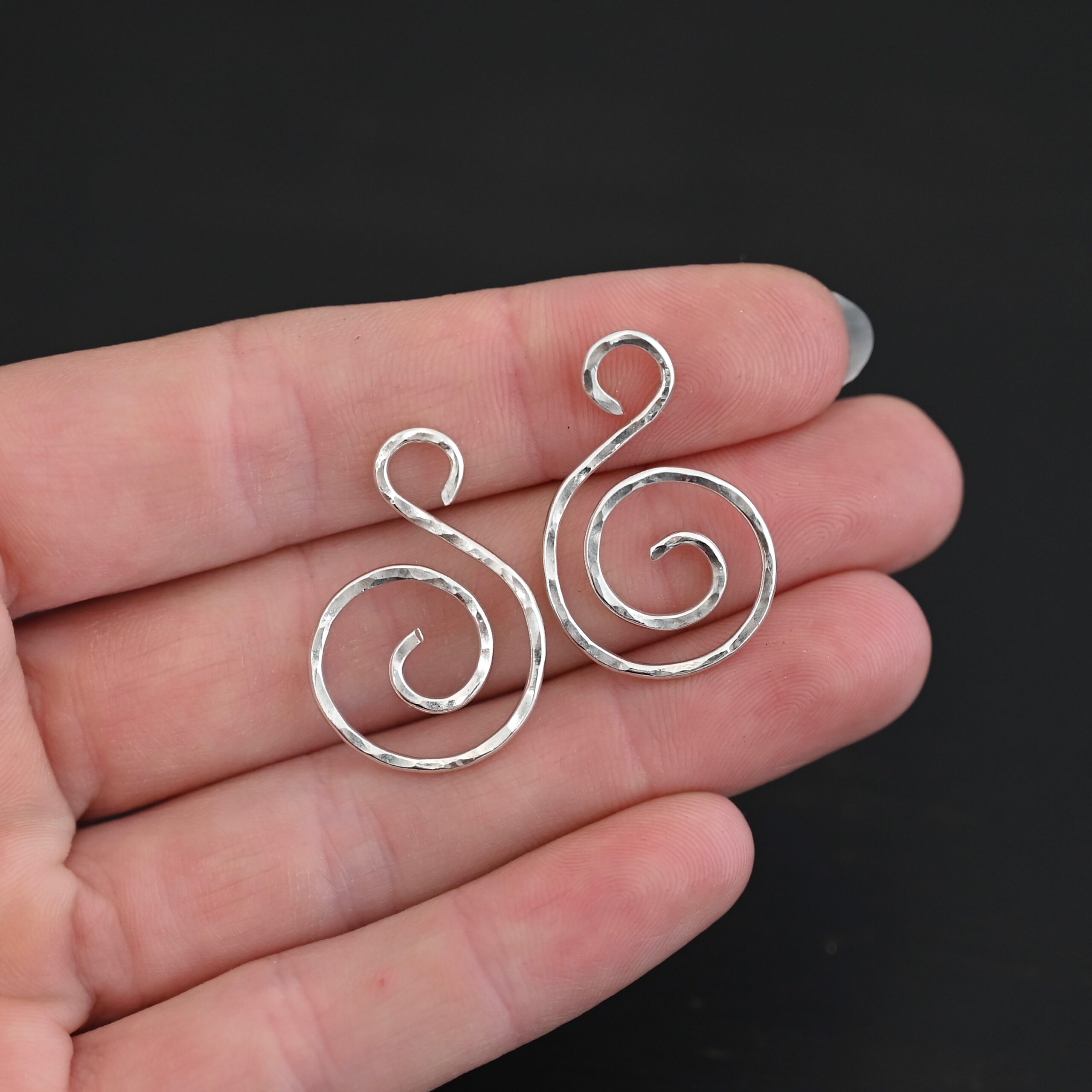 Sterling Silver Teagan S Shaped Pair - shiny hammered shown in hand