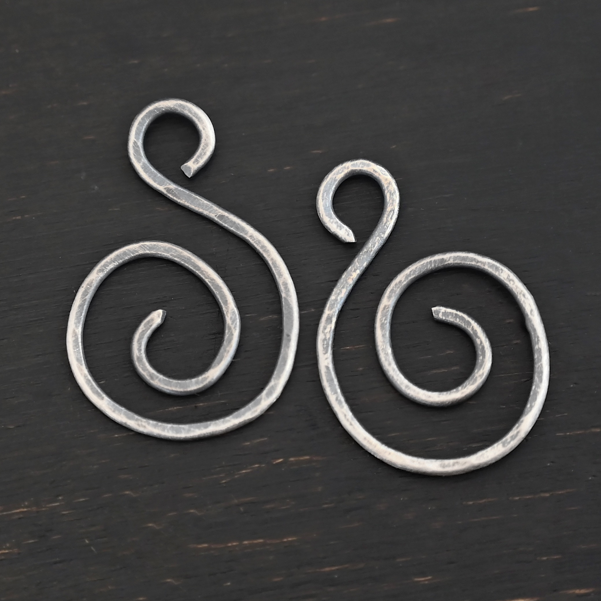 Sterling Silver Teagan S Shaped Pair - oxidized hammered shown on dark background