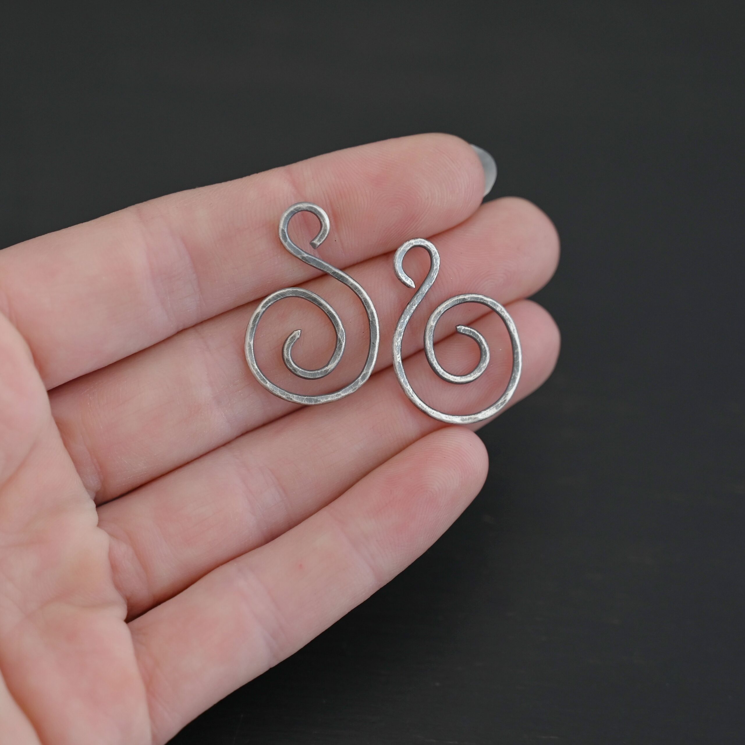 Sterling Silver Teagan S Shaped Pair - oxidized hammered shown in hand