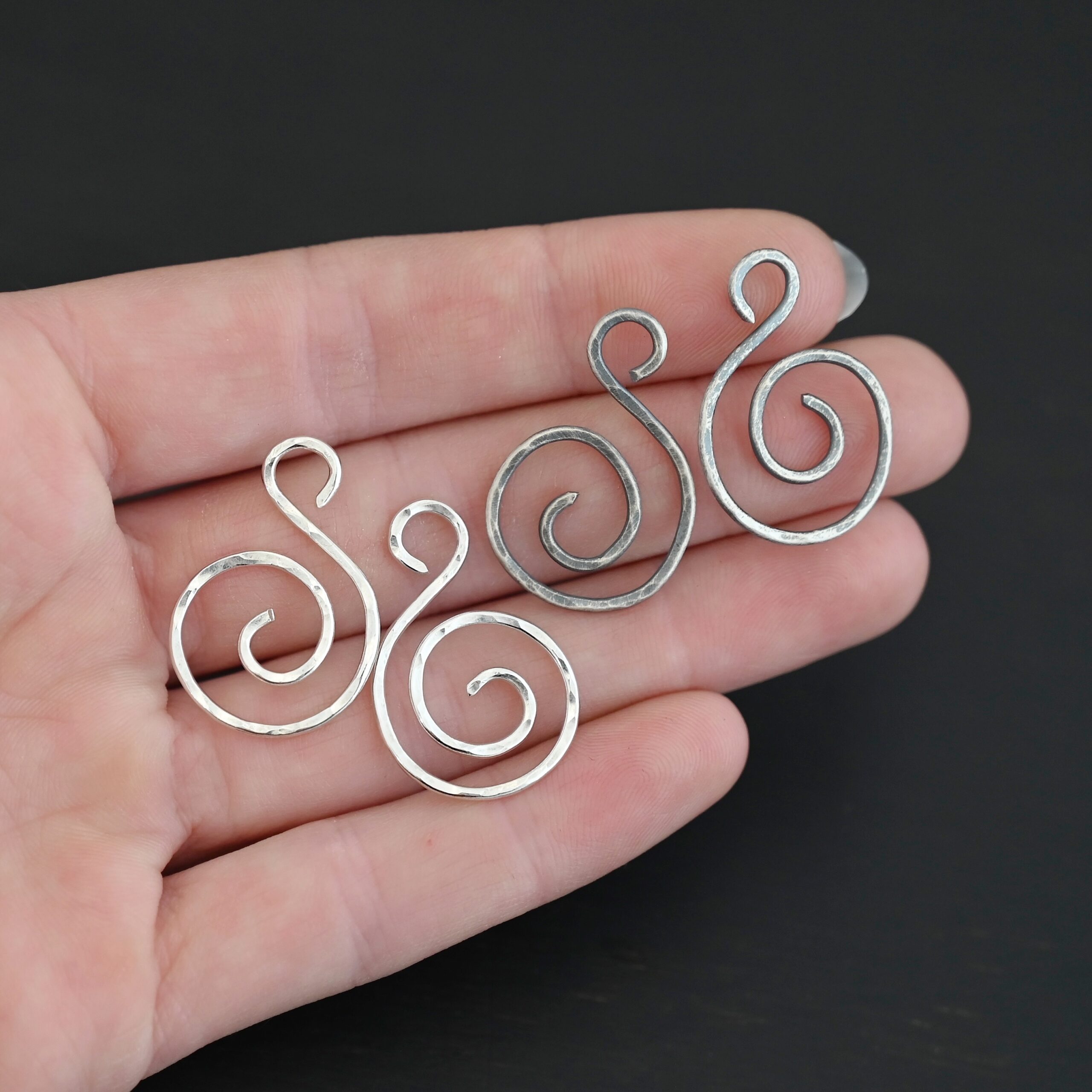 Sterling Silver Teagan S Shaped Pair - oxidized & shiny hammered shown in hand