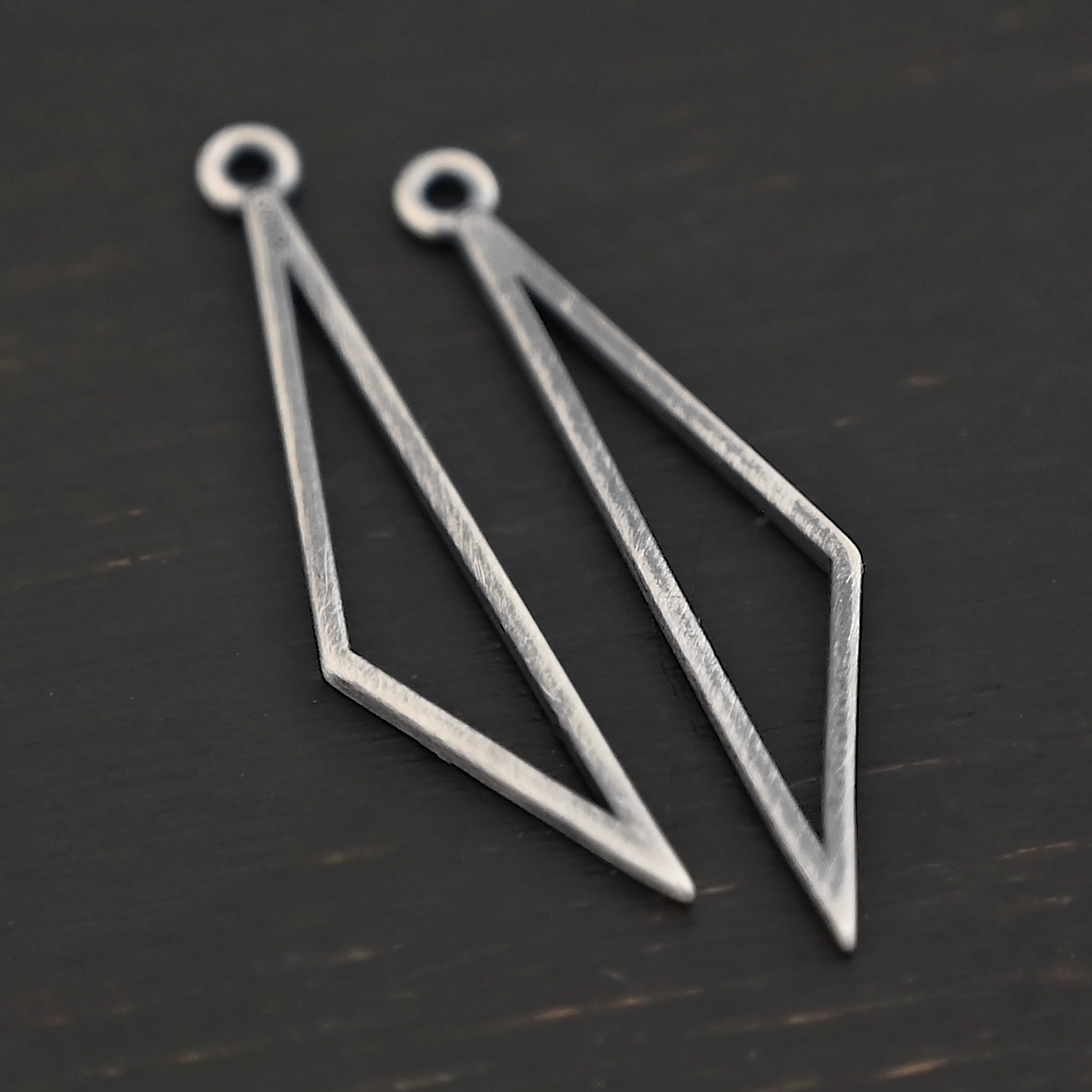 Sterling Silver Trace Triangle Chandelier - oxidized smooth small shown on dark background