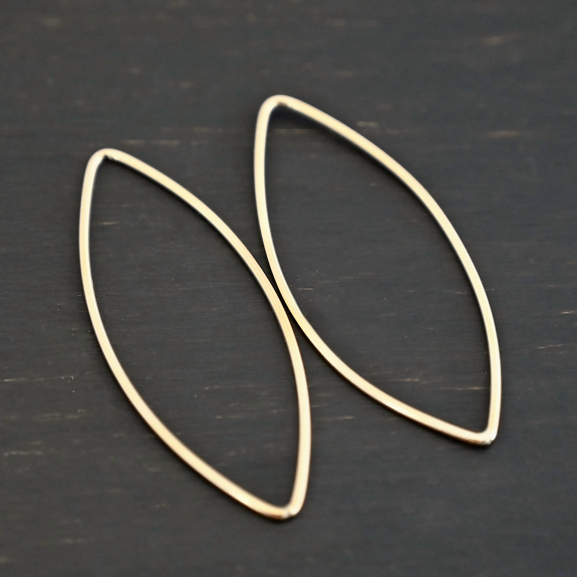 Tina - 14k Gold Filled Marquise Chandelier 38x16mm smooth shown on dark background