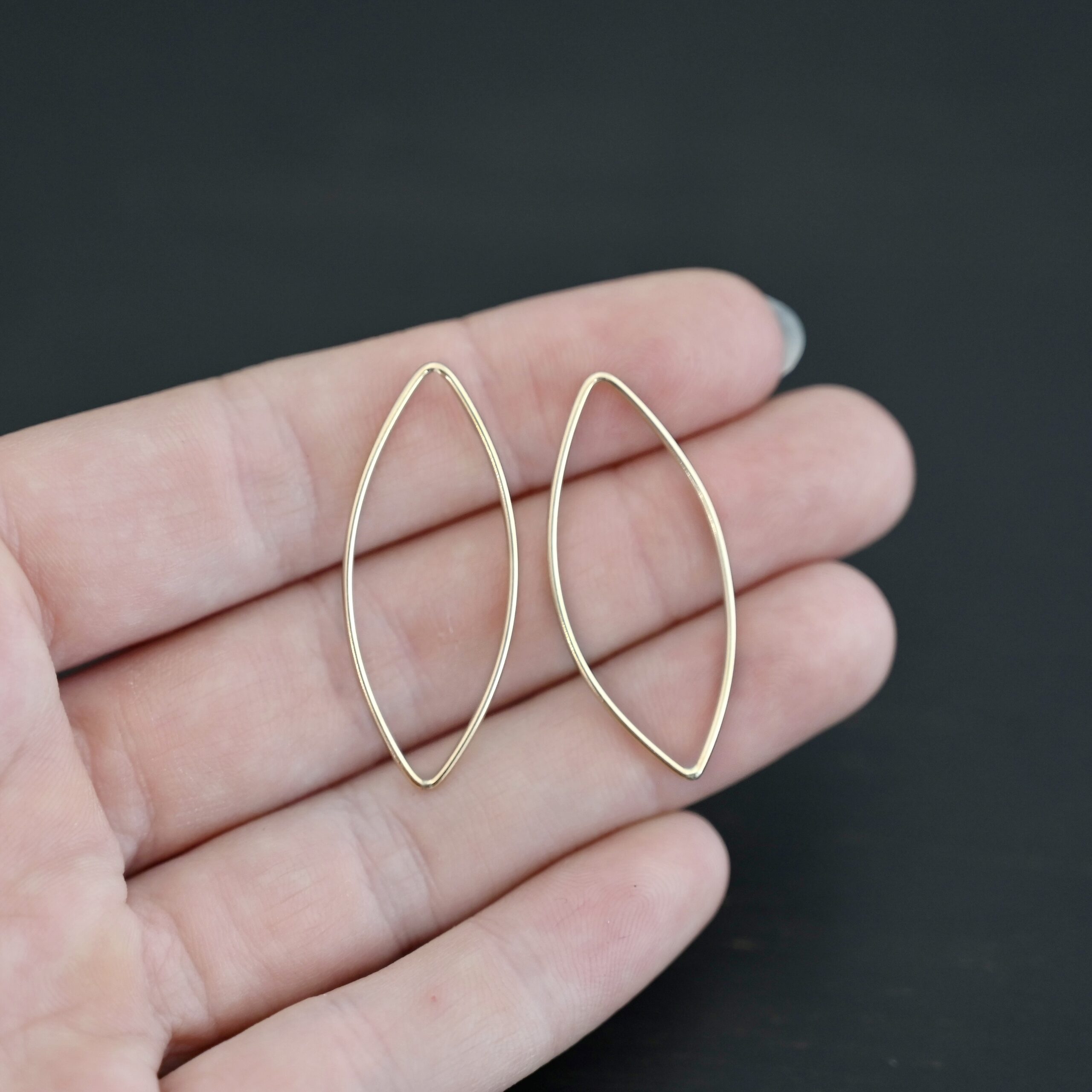 Tina - 14k Gold Filled Marquise Chandelier 38x16mm smooth shown in hand