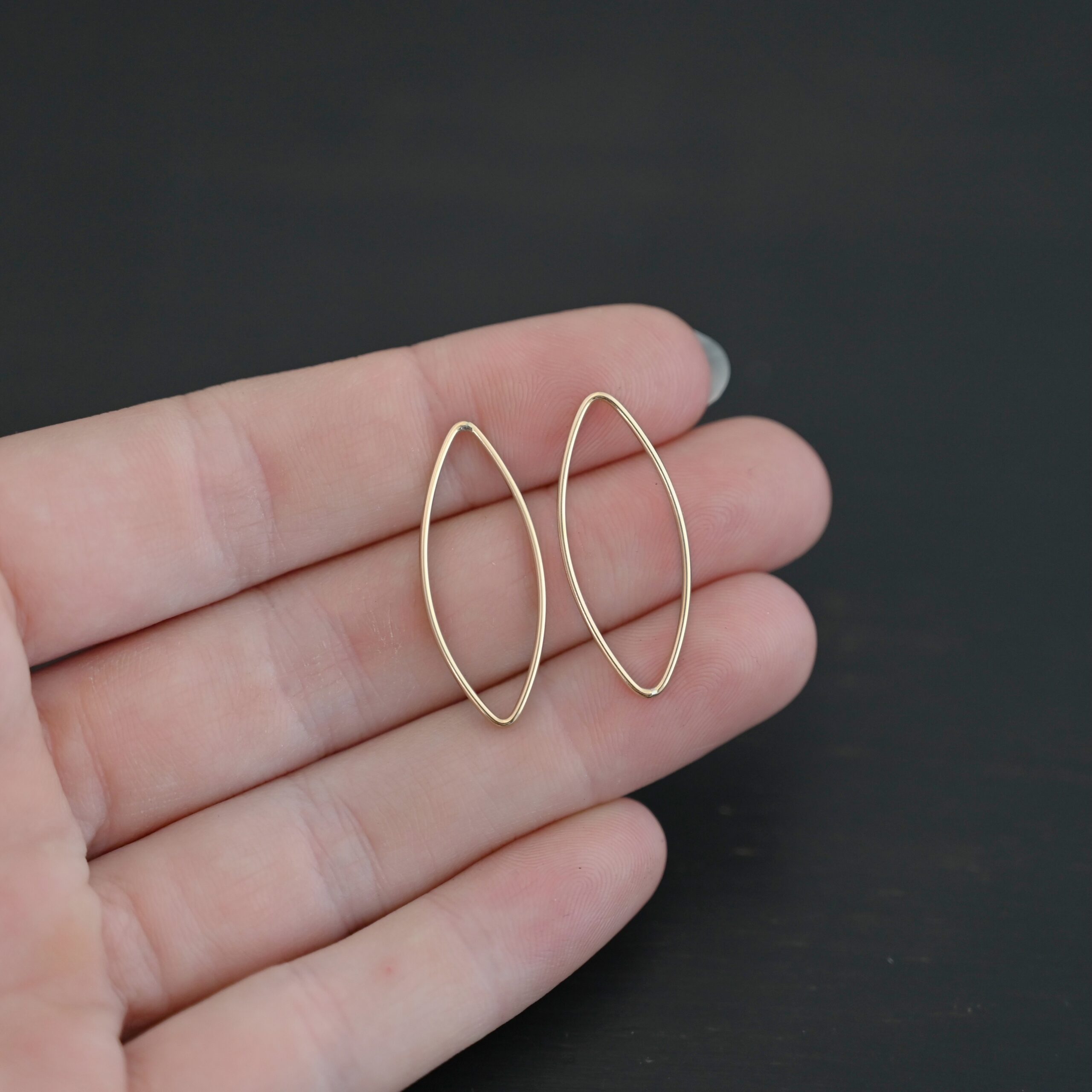 Tina - 14k Gold Filled Marquise Chandelier 29x12mm smooth shown in hand