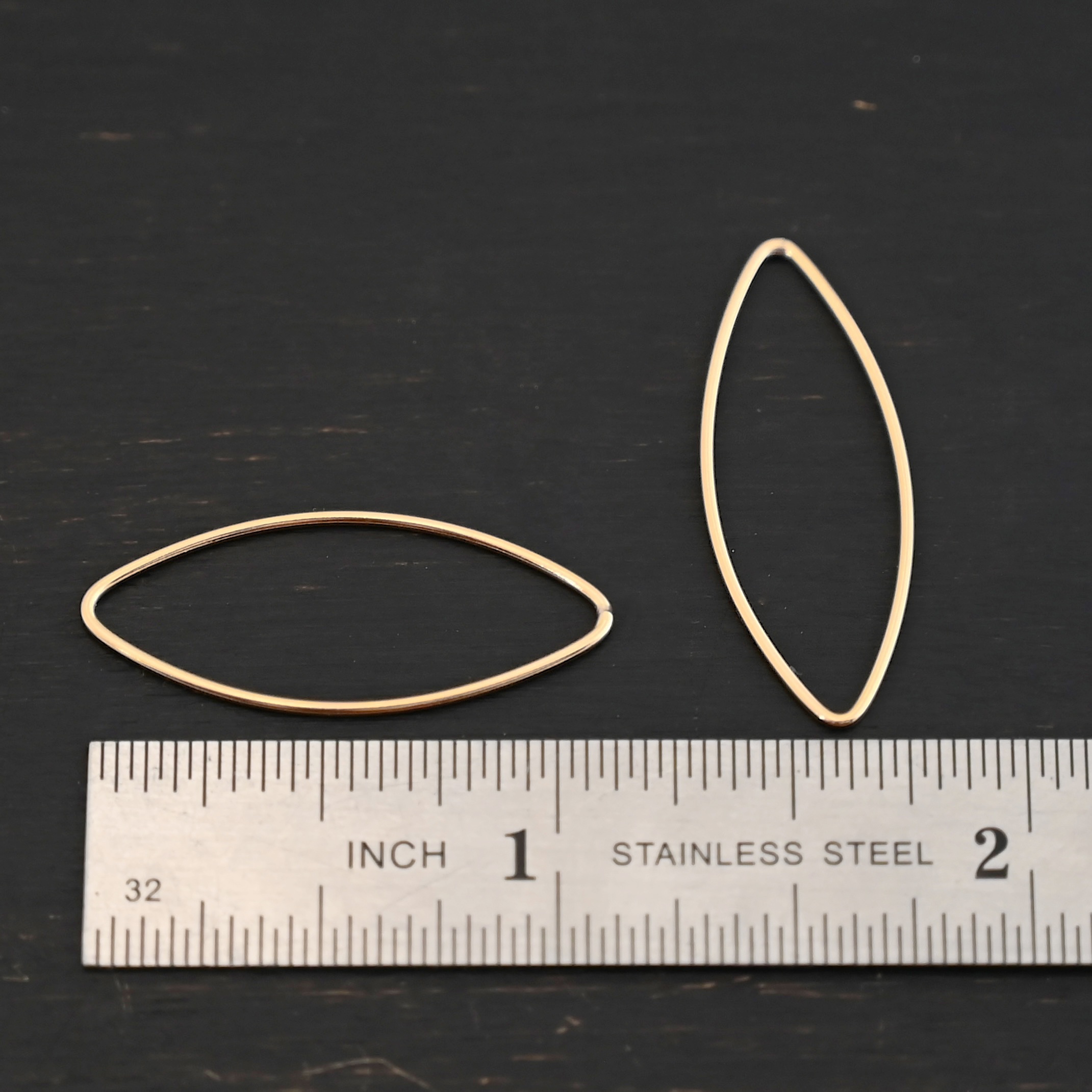 Tina - 14k Gold Filled Marquise Chandelier 29x12mm smooth shown by ruler