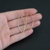 Tina - 14k Gold Filled Marquise Chandelier hammered 38x16mm shown in hand
