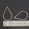 Talia - 14k gold filled Teardrop Chandelier - hammered 29x20mm shown by ruler