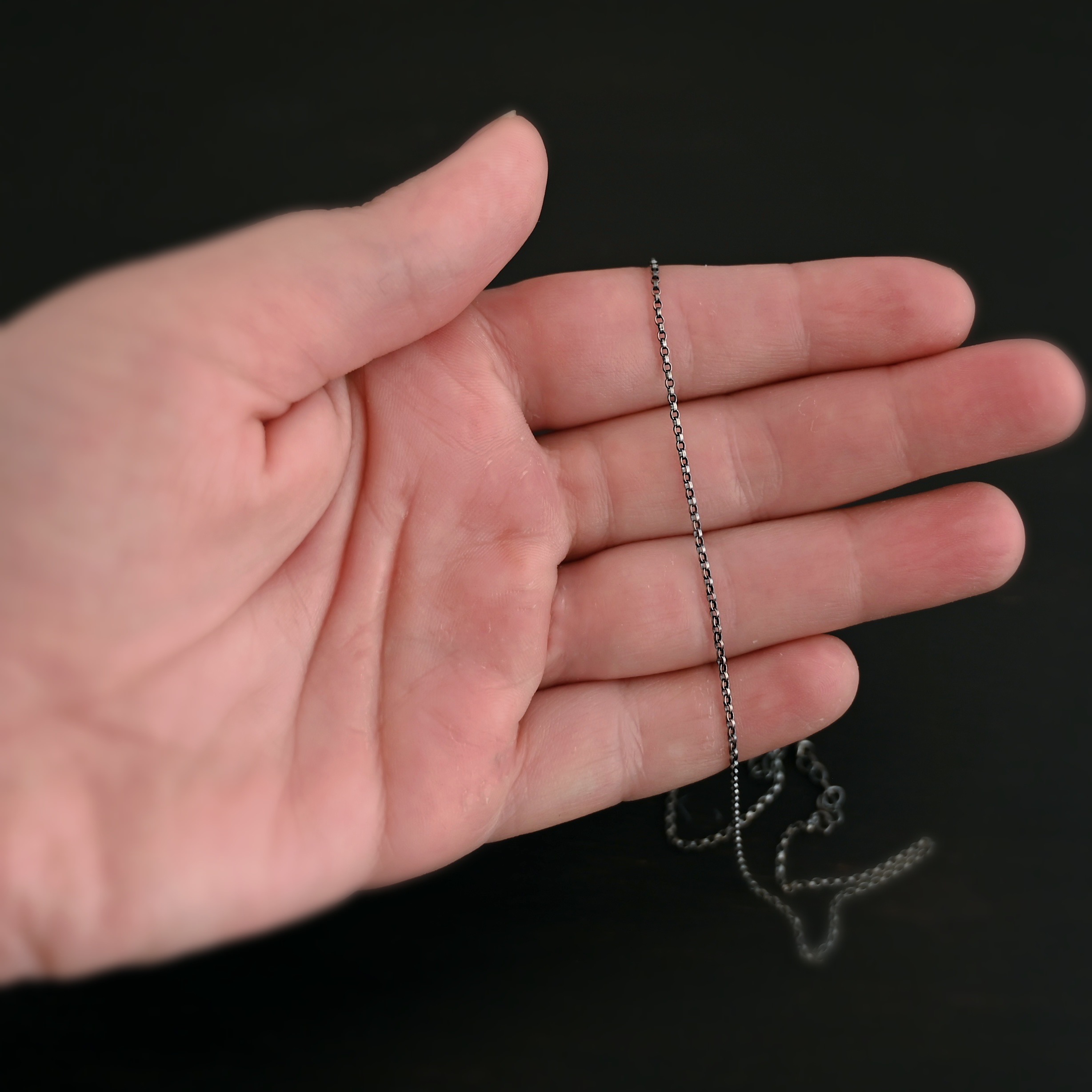 Sterling Silver Cassie Chain - oxidized shown in hand