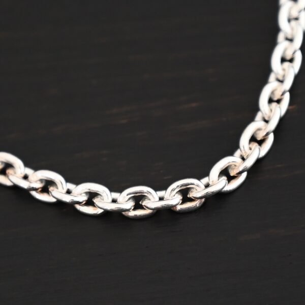 Joan Chain shiny shown on dark background