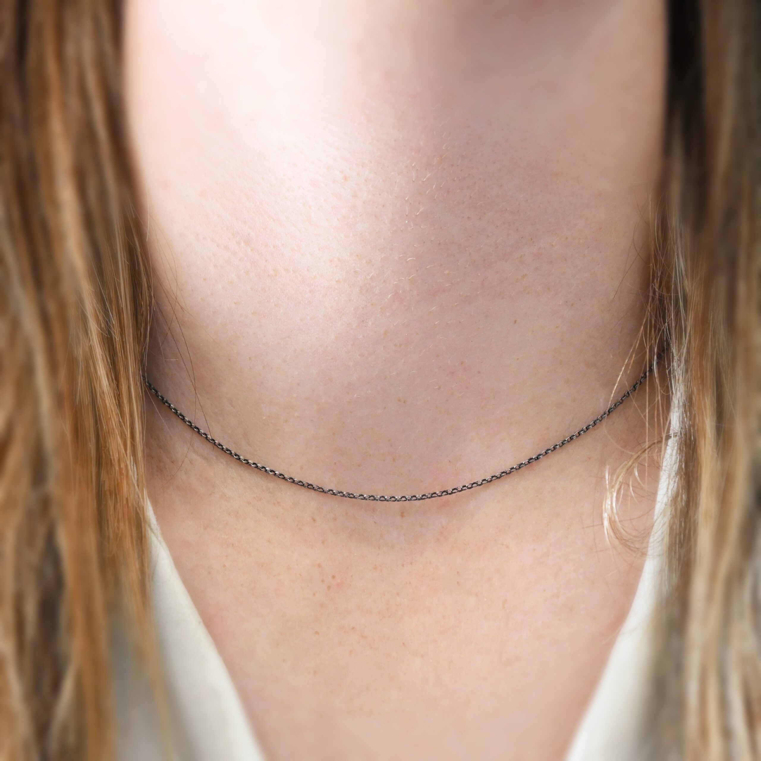 Sterling Silver Cassie Chain - 16-19" oxidized shown on model with white shirt and brown hair