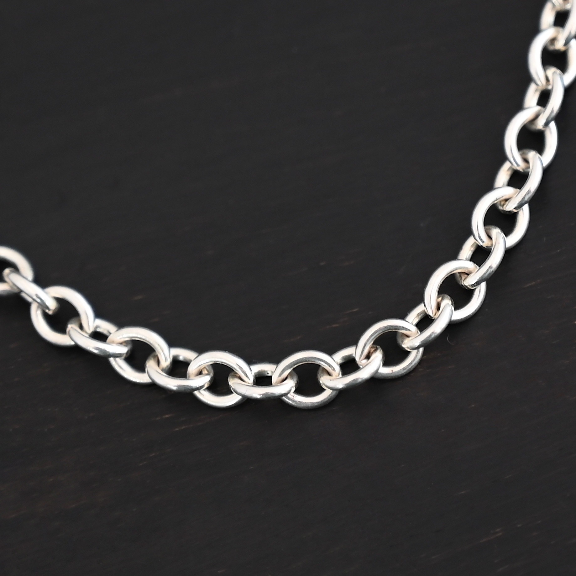 Joy Chain shiny shown on dark background