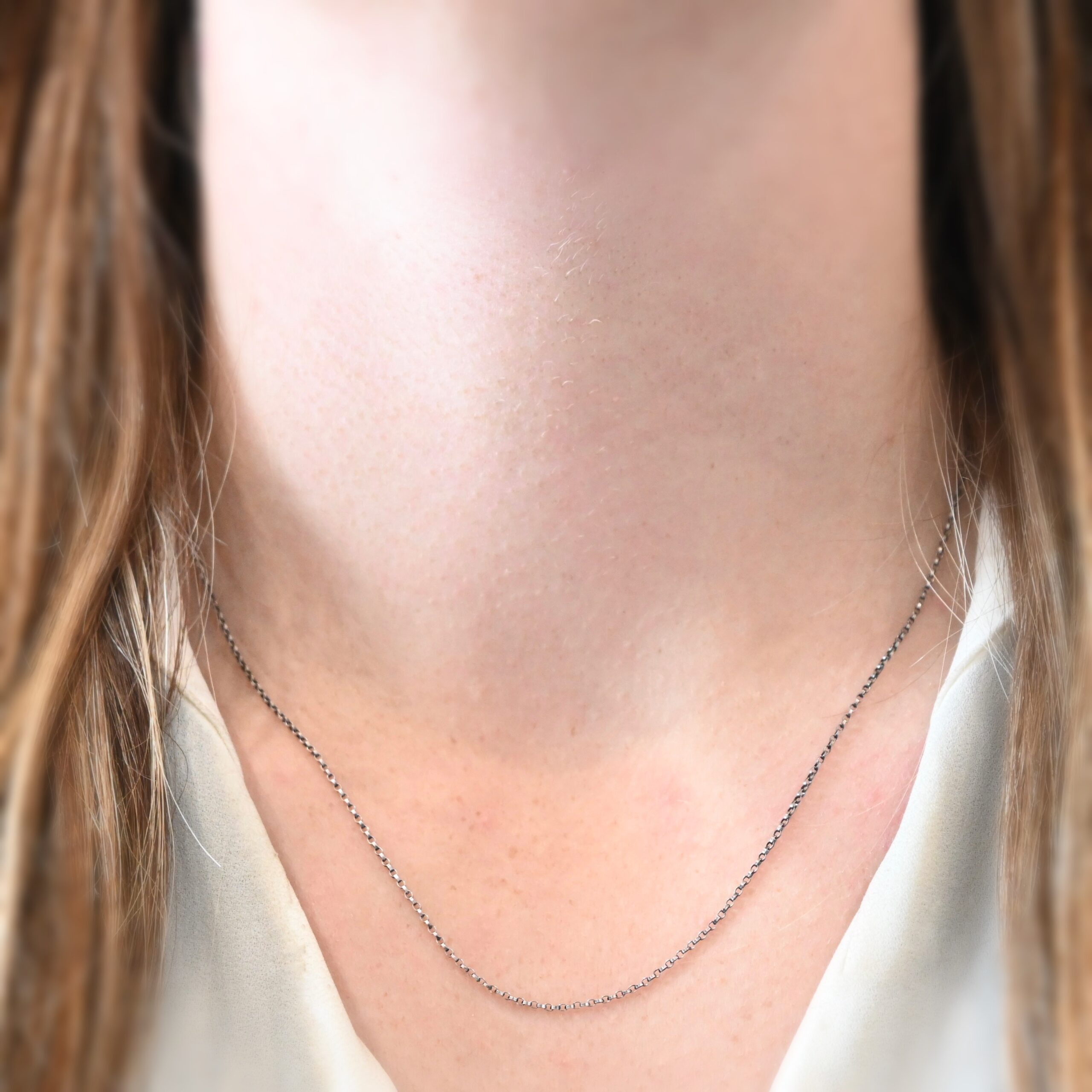 Sterling Silver Cassie Chain - 18-21" oxidized shown on model with white shirt and brown hair