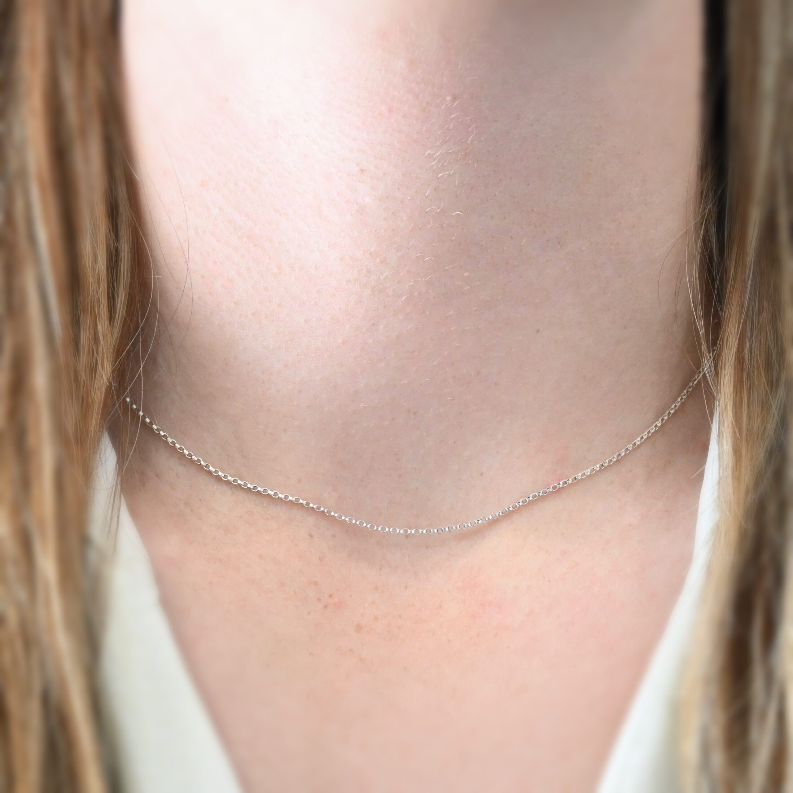 Sterling Silver Cassie Chain - 16-19" shiny shown on model with white shirt and brown hair