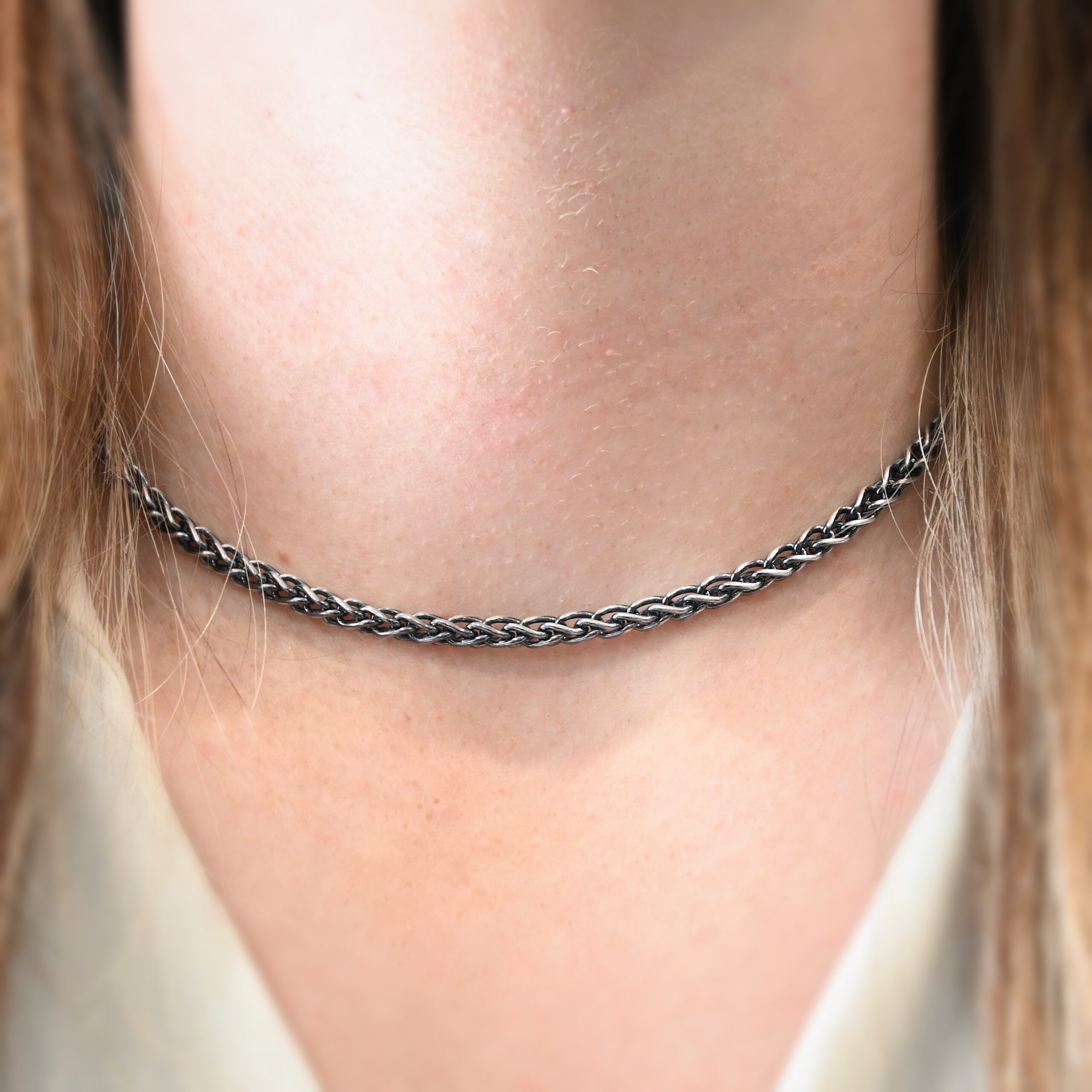 King Cobra Chain - 16-19" Oxidized shown on model with white shirt and brown hair