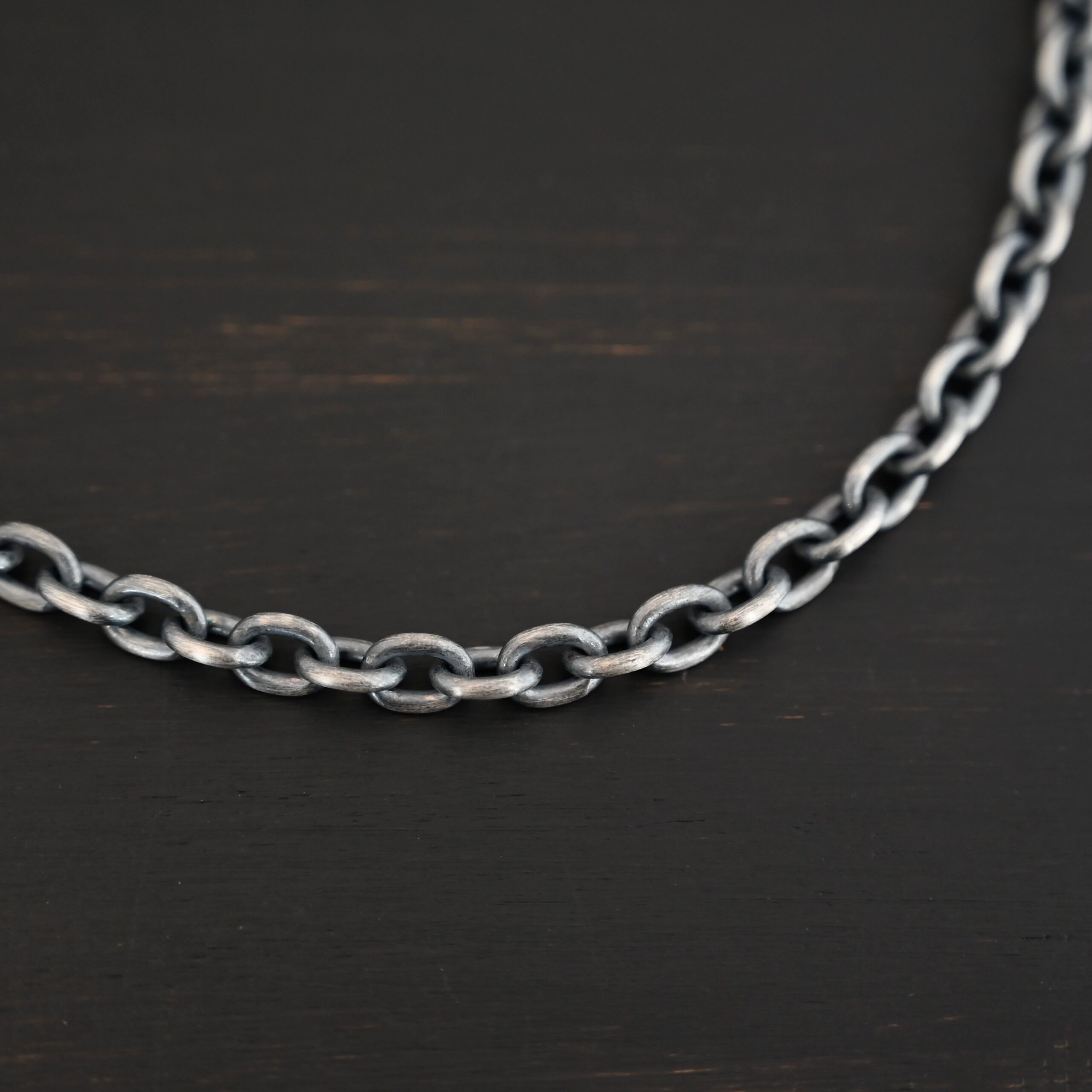 Georgia Chain oxidized shown on dark background