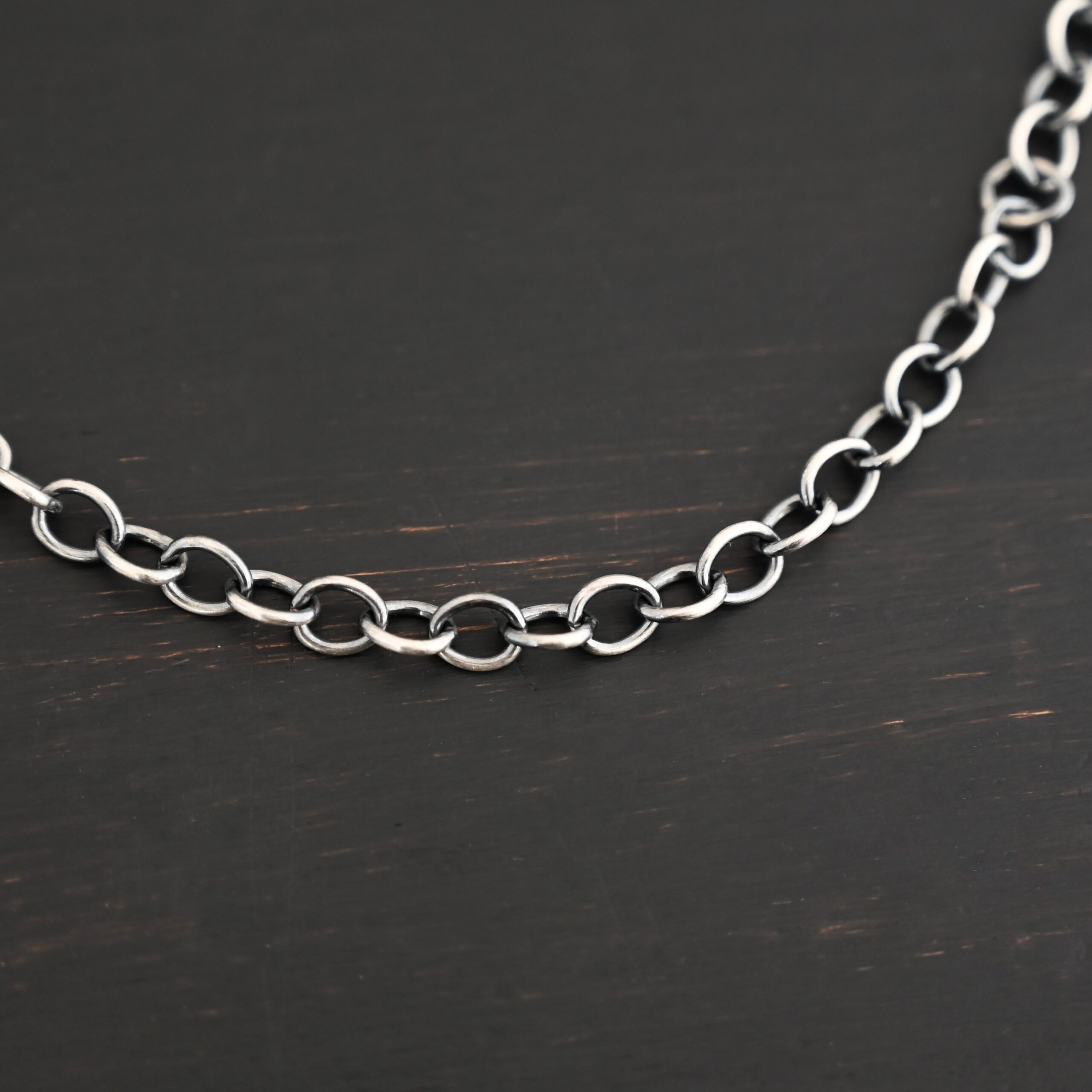 Jay Chain oxidized shown on dark background