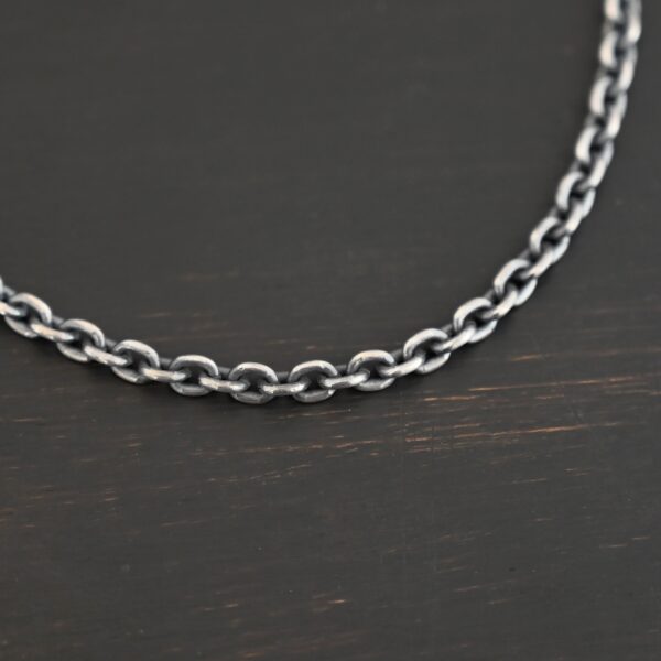 Joan Chain oxidized shown on dark background