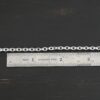 Lauren Chain shiny shown by ruler