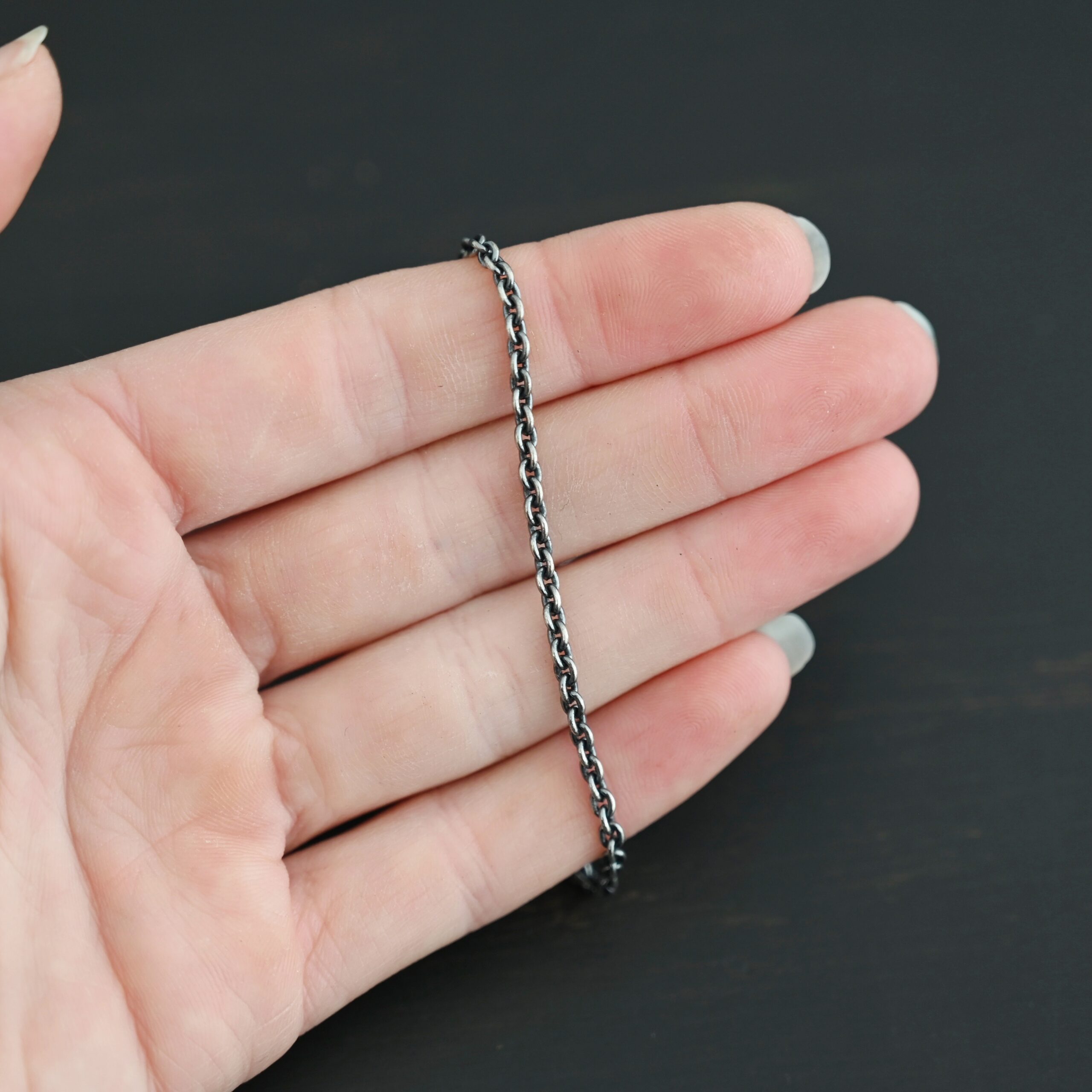 Maria Chain oxidized shown in hand